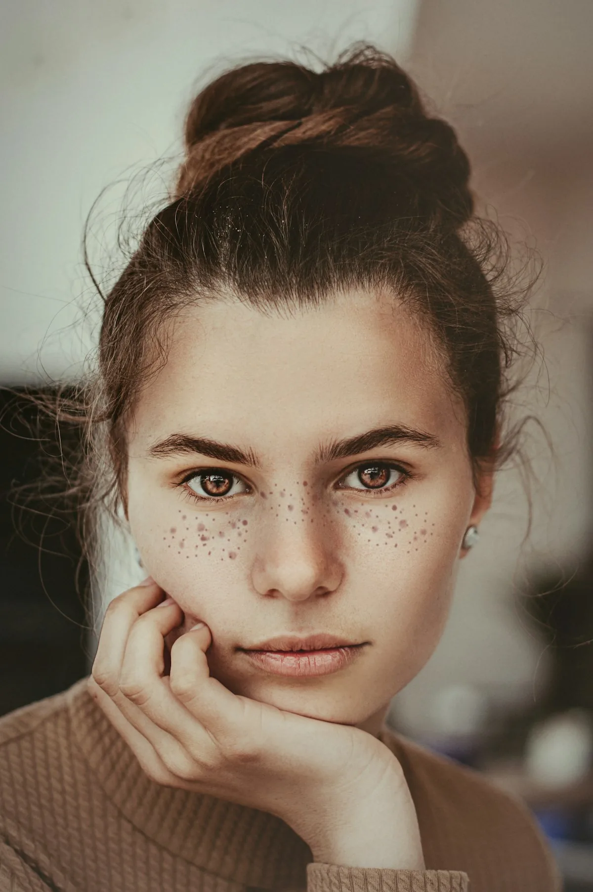 A woman looking thoughtful