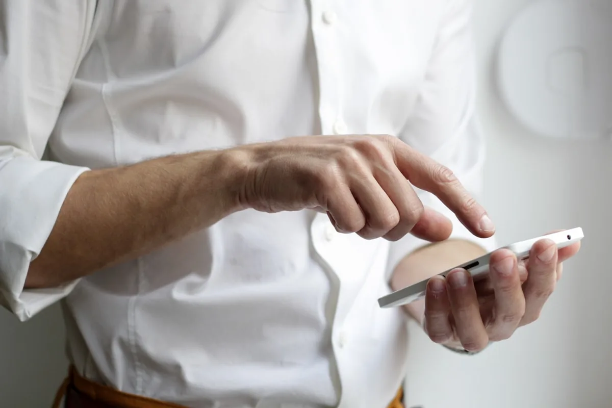 A person using a budgeting app on a phone